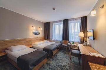 Фото номера Трехместный номер Отель Hotel Pod Jesiotrem г. Łabiszyn 2