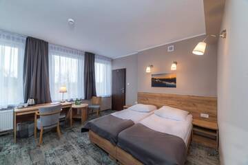 Фото номера Трехместный номер Отель Hotel Pod Jesiotrem г. Łabiszyn 3