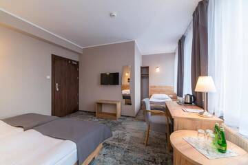 Фото номера Трехместный номер Отель Hotel Pod Jesiotrem г. Łabiszyn 3